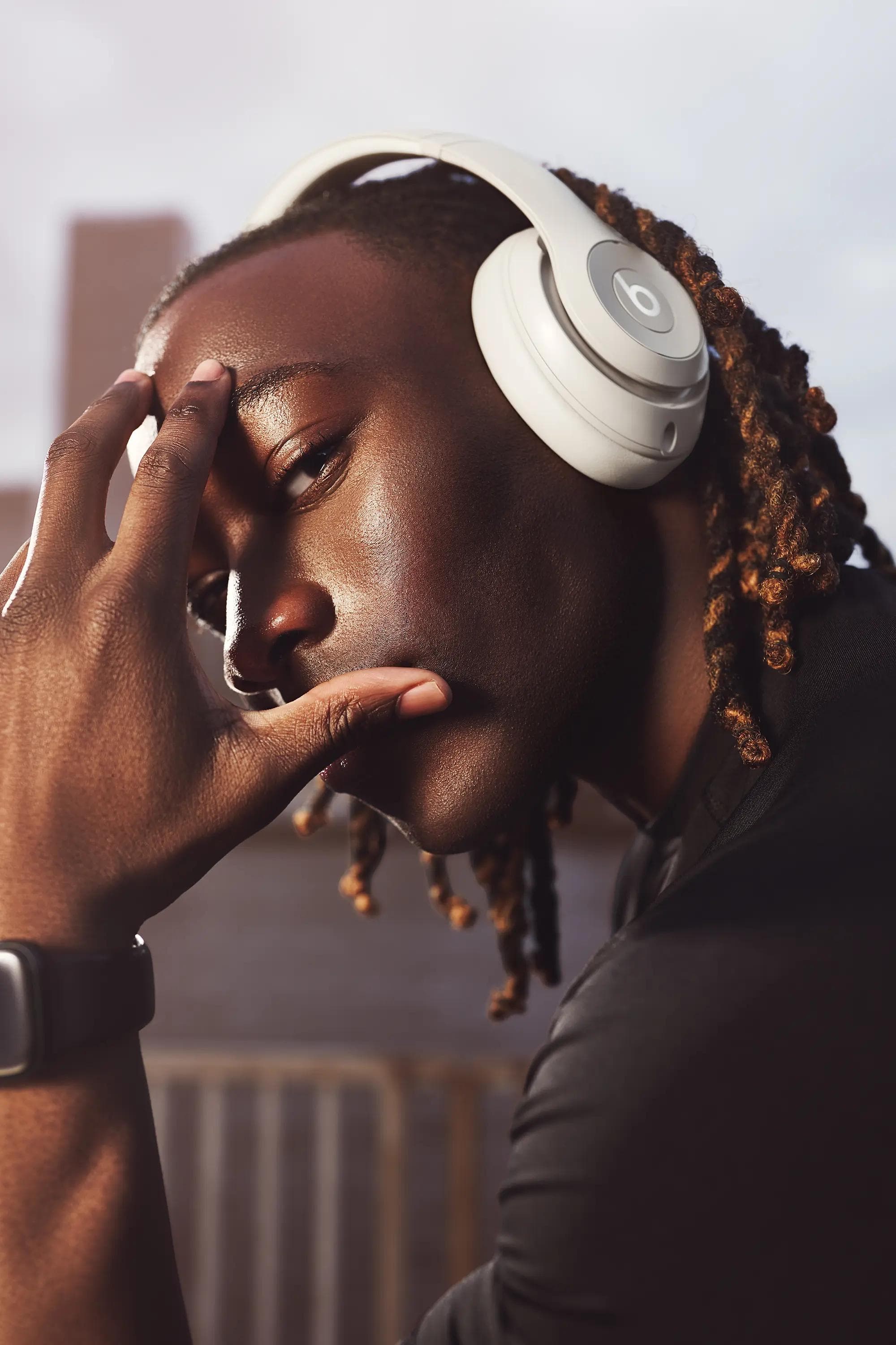 close up portrait man wearing headphones outdoor London natural light