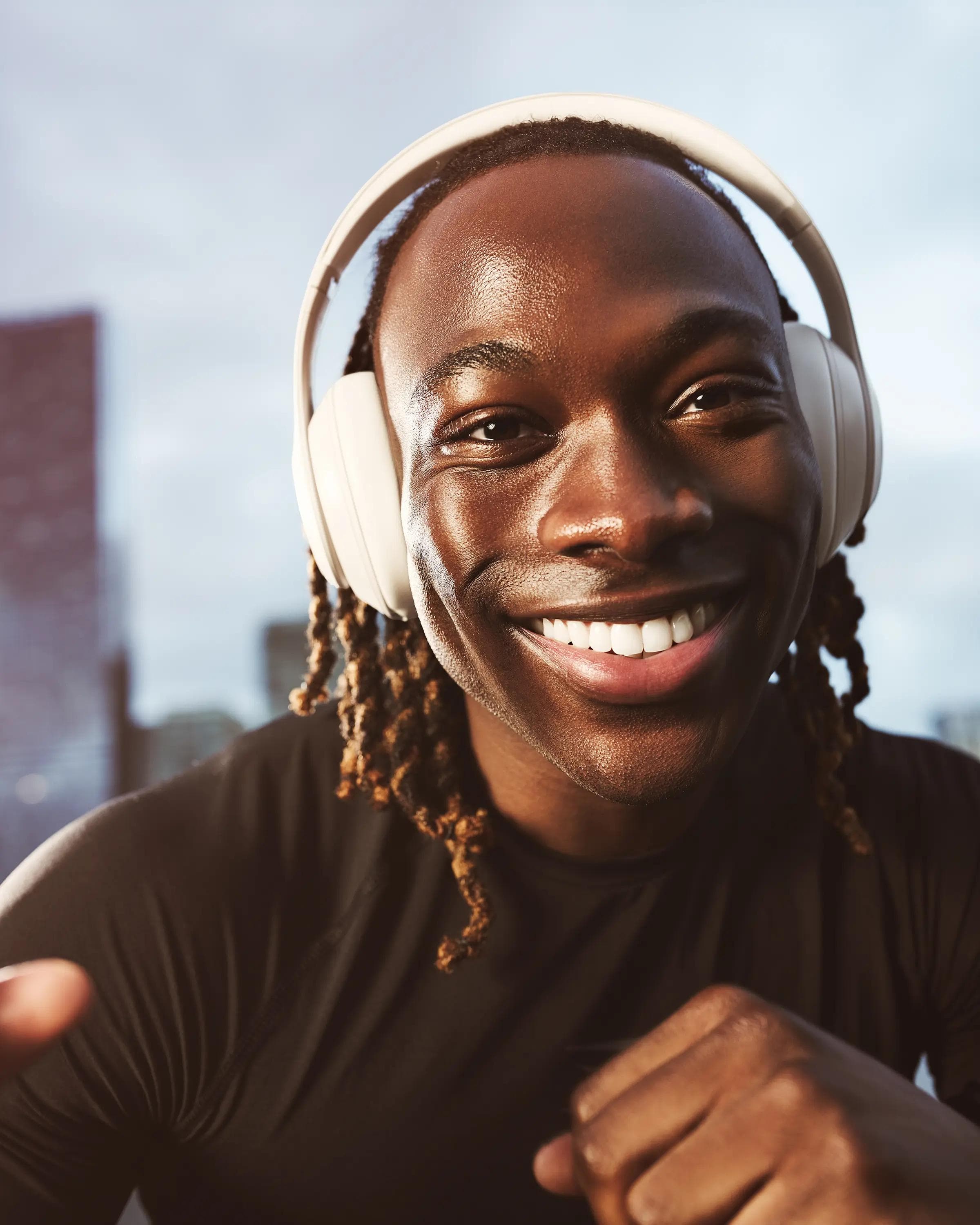 man wearing headphones smiling portrait London lifestyle photography