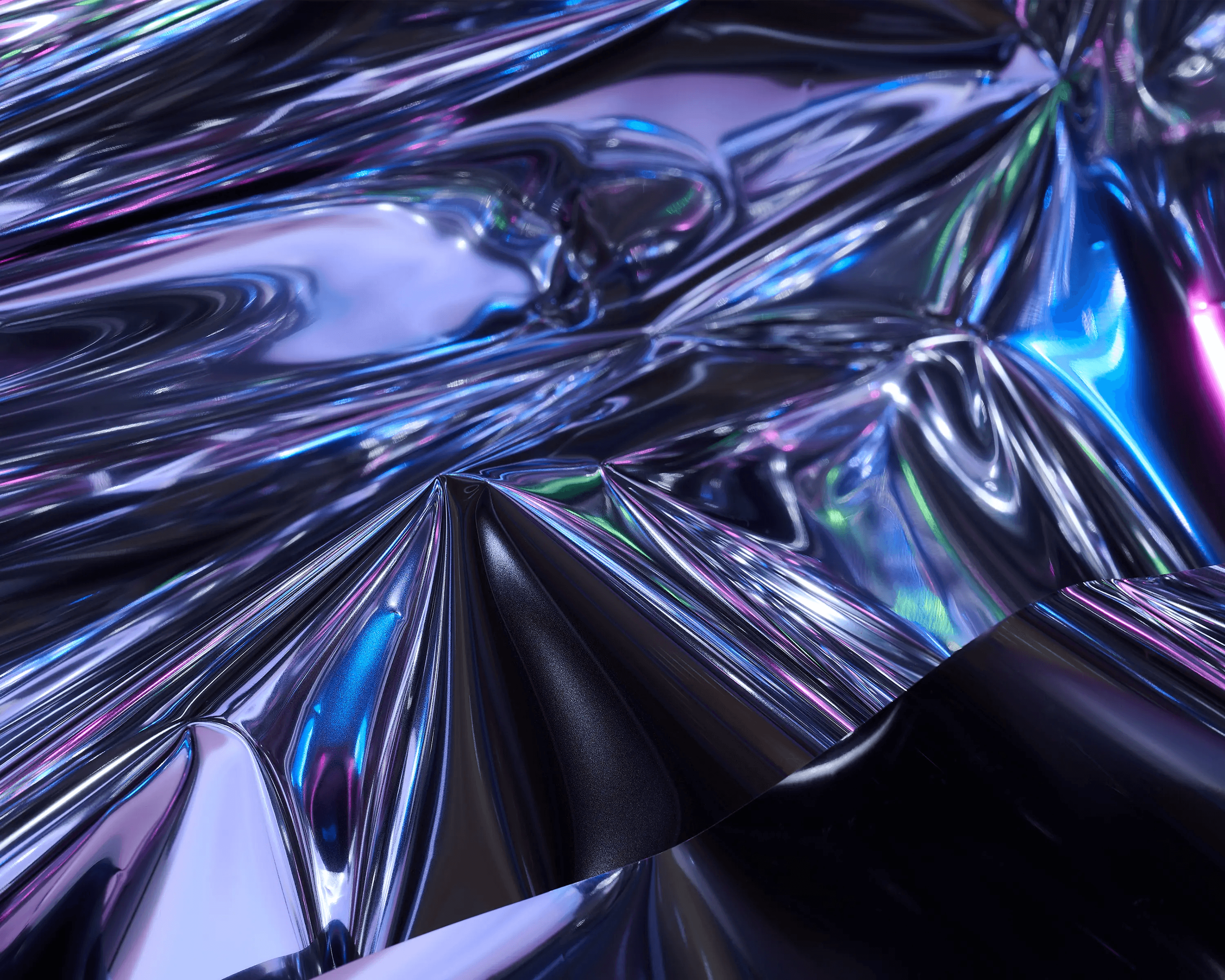 close up of holographic silver material folded into angular geometric shapes with purple and blue iridescent light, abstract backdrop photography Manchester