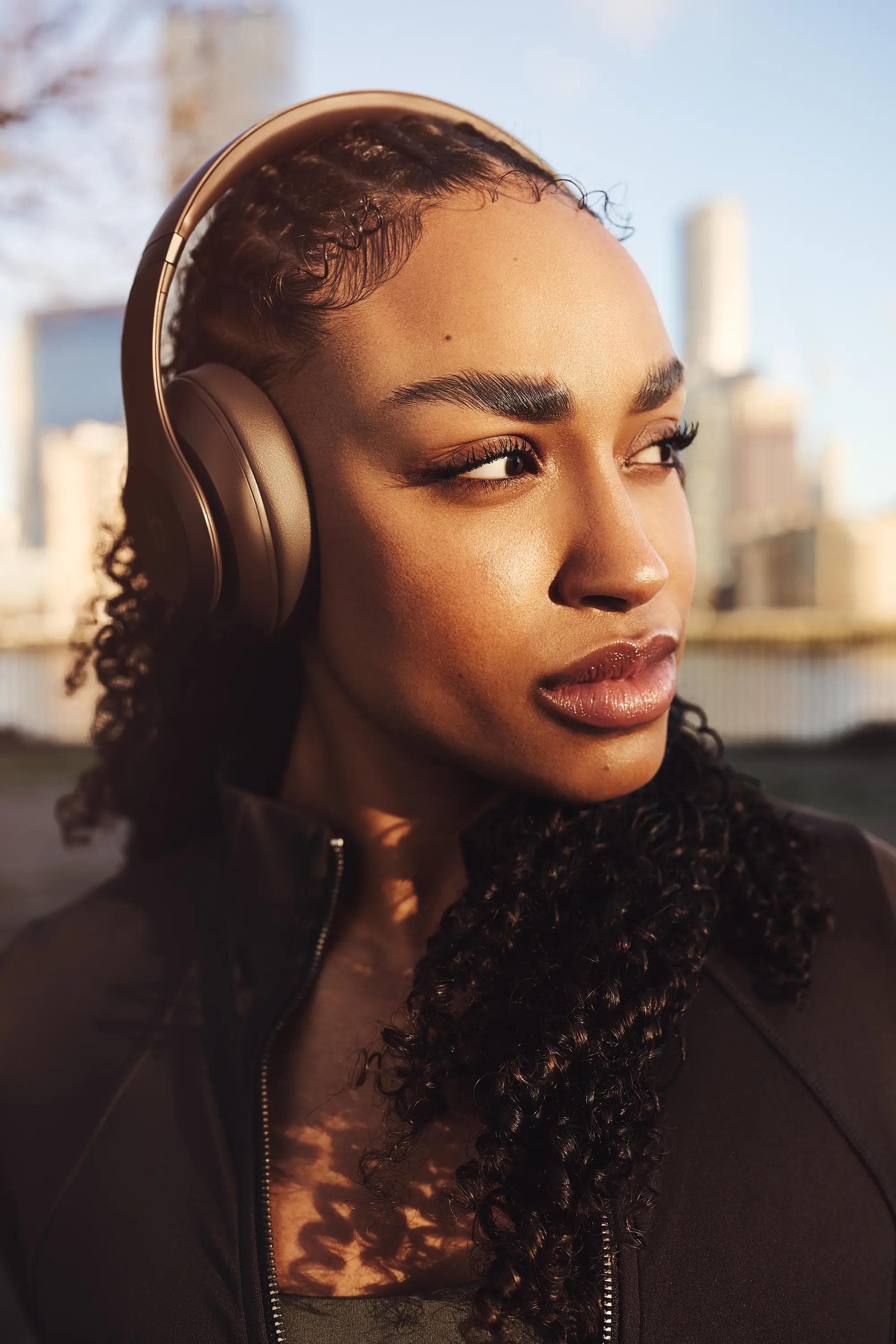 female athlete wearing headphones portrait outdoor London lifestyle photography